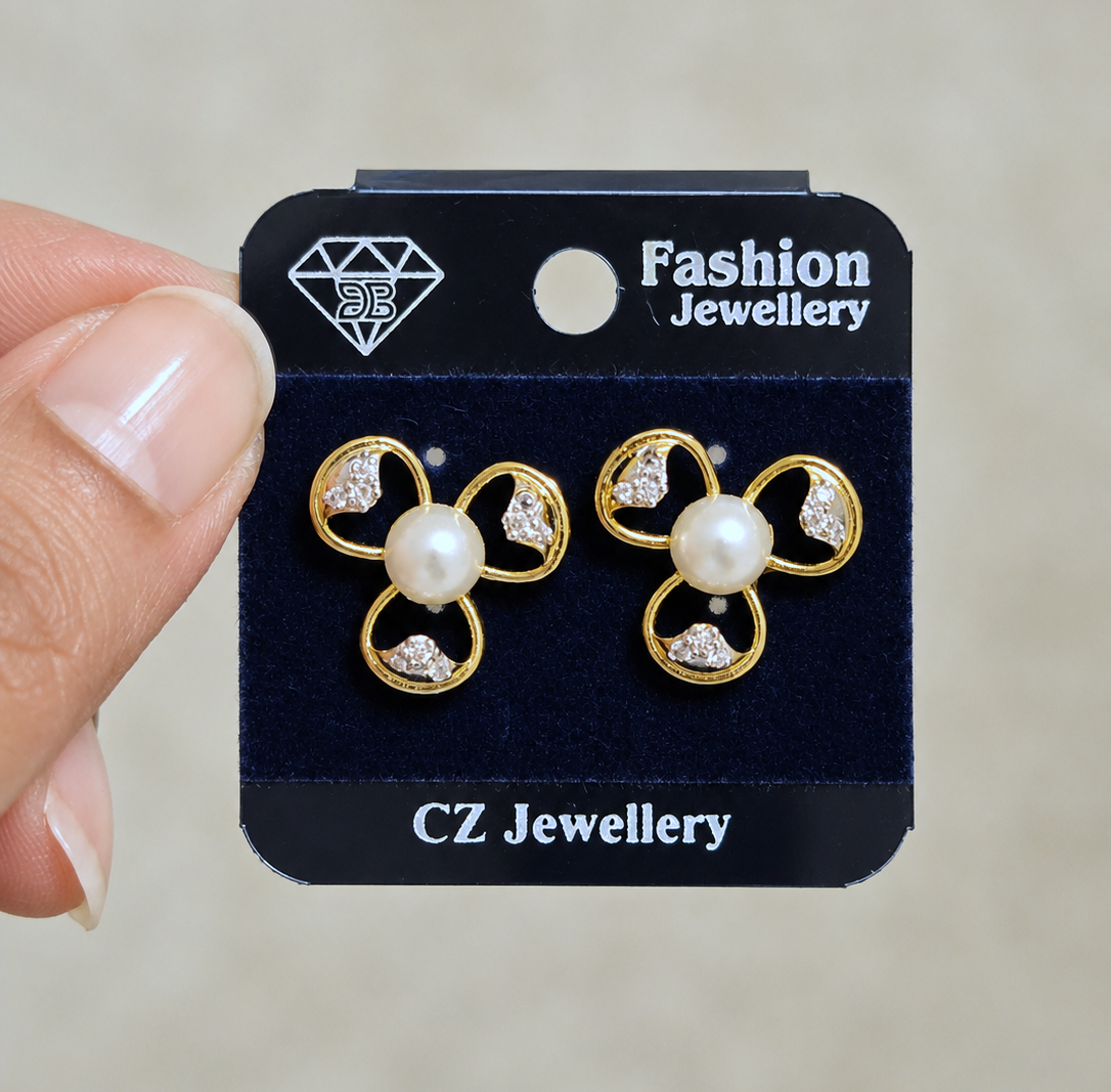 Floral Pearl Studs in Gold Tone
