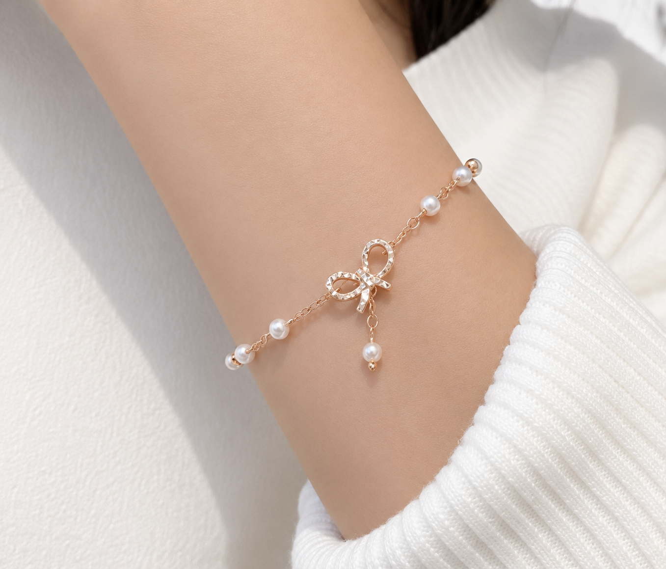 Elegant Pearl Bow Charm Bracelet