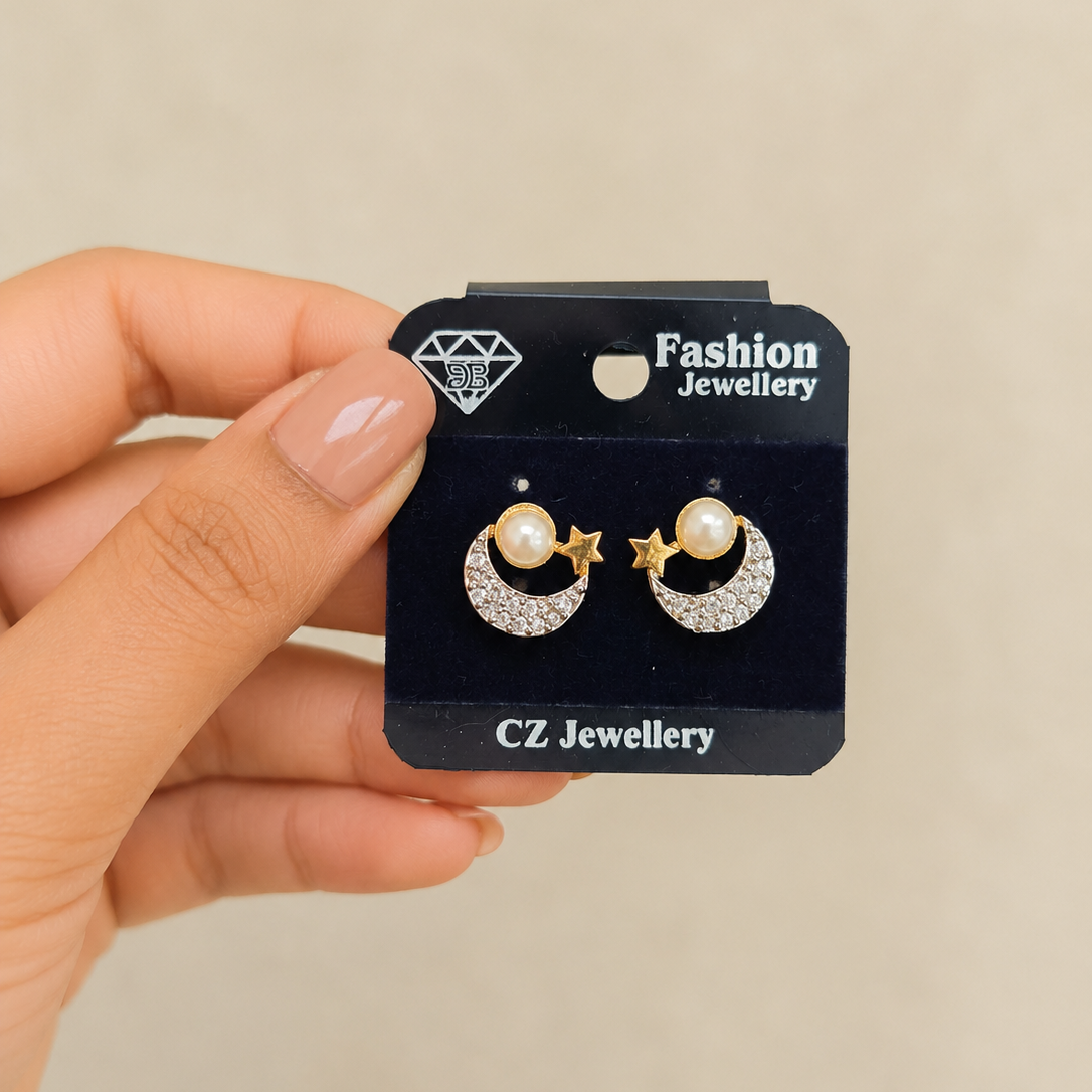Moon and Star Pearl Studs in Gold Tone