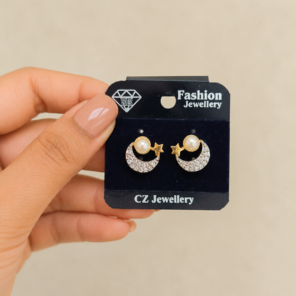 Moon and Star Pearl Studs in Gold Tone