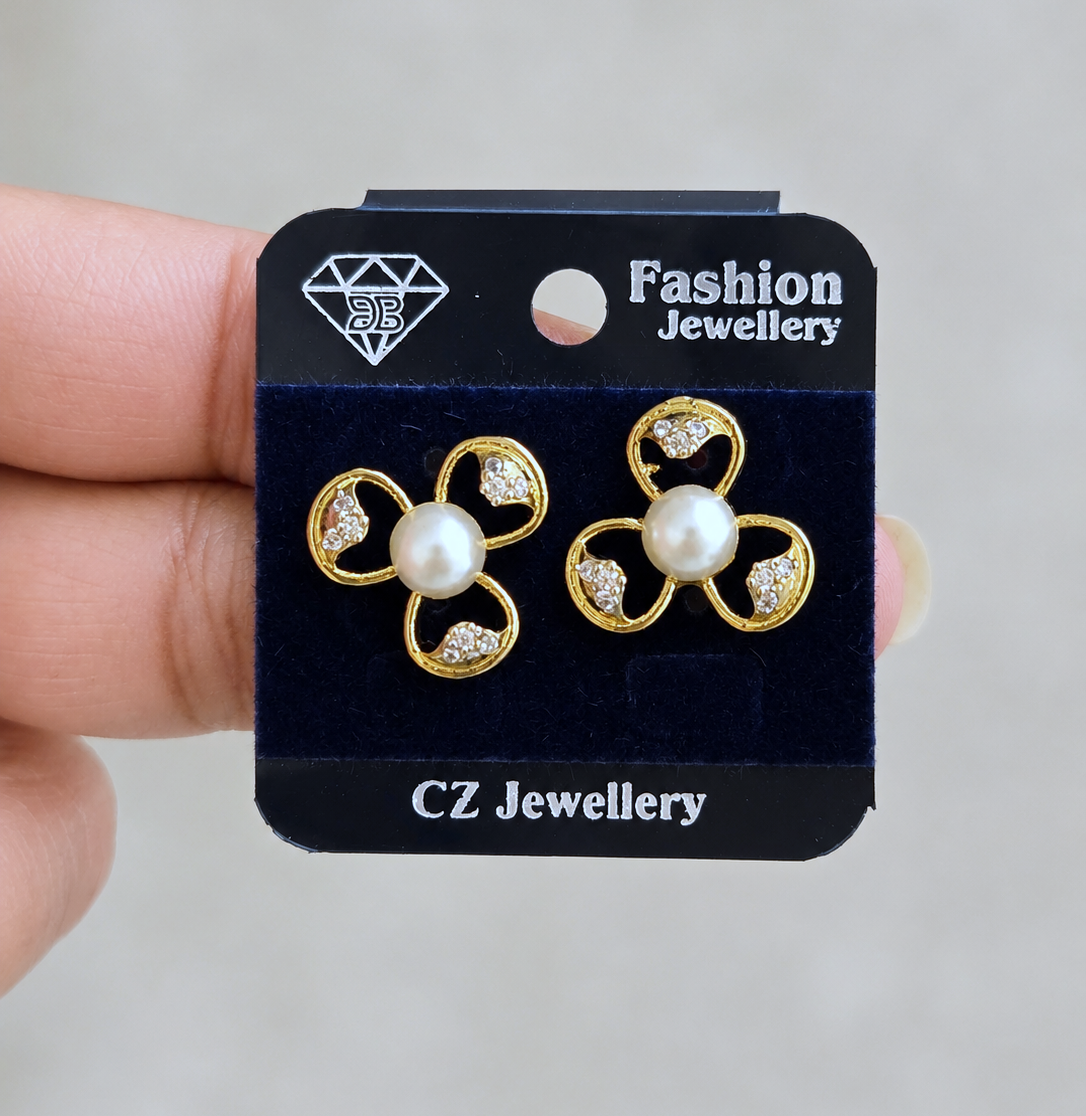 Floral Pearl Studs in Gold Tone