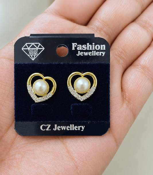 Heart Shaped Pearl Studs in Gold Tone