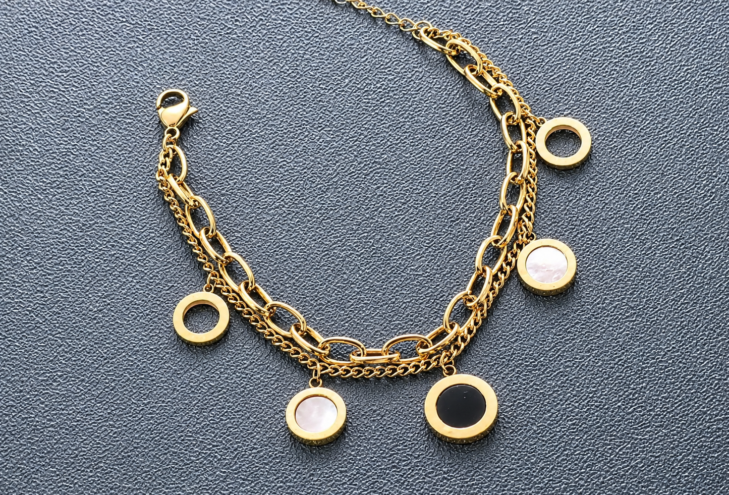 Multi-Layered Charm Bracelet in Gold Tone