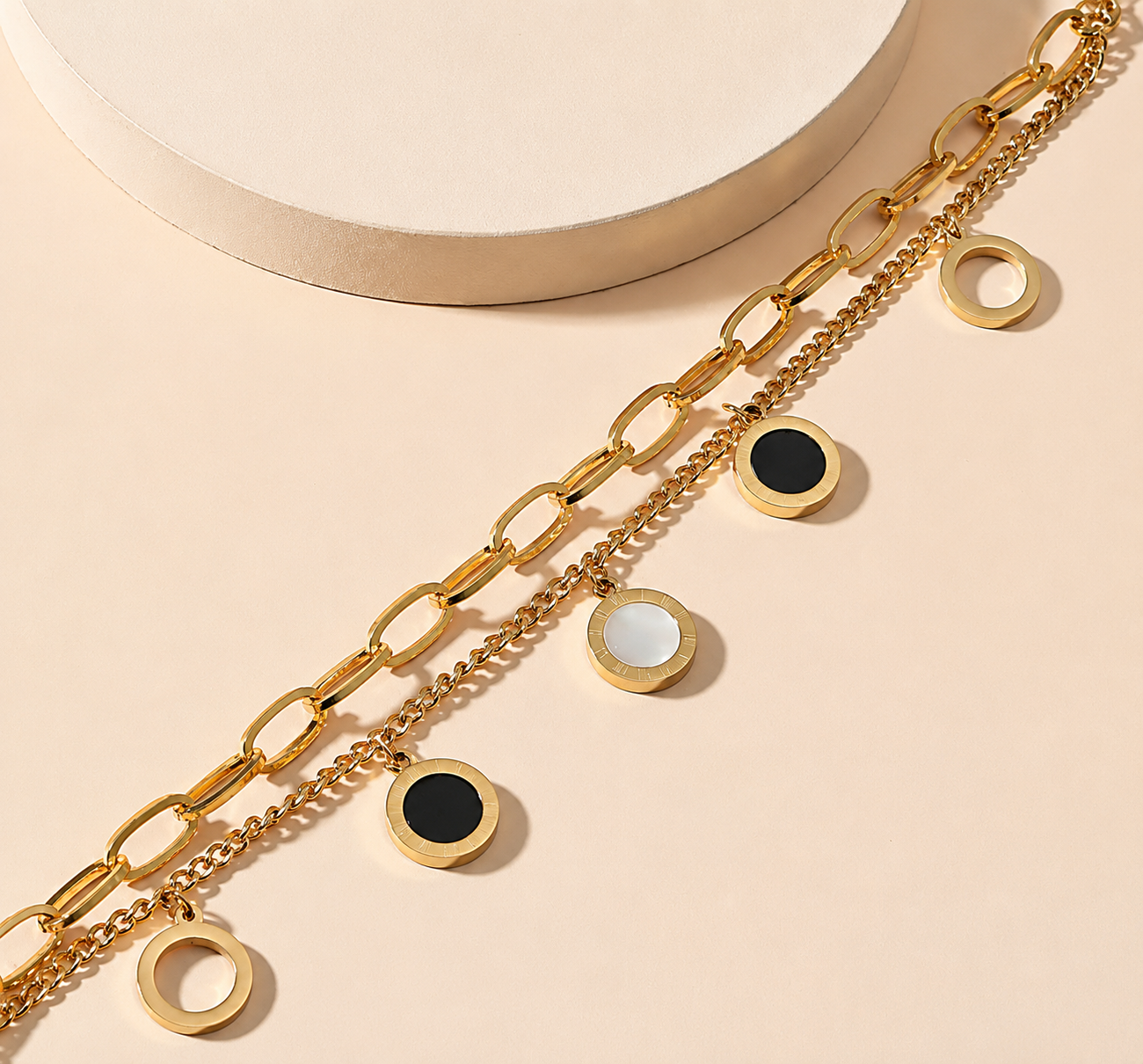 Multi-Layered Charm Bracelet in Gold Tone