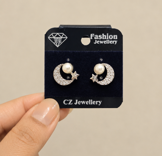 Moon and Star Pearl Studs in Silver Tone