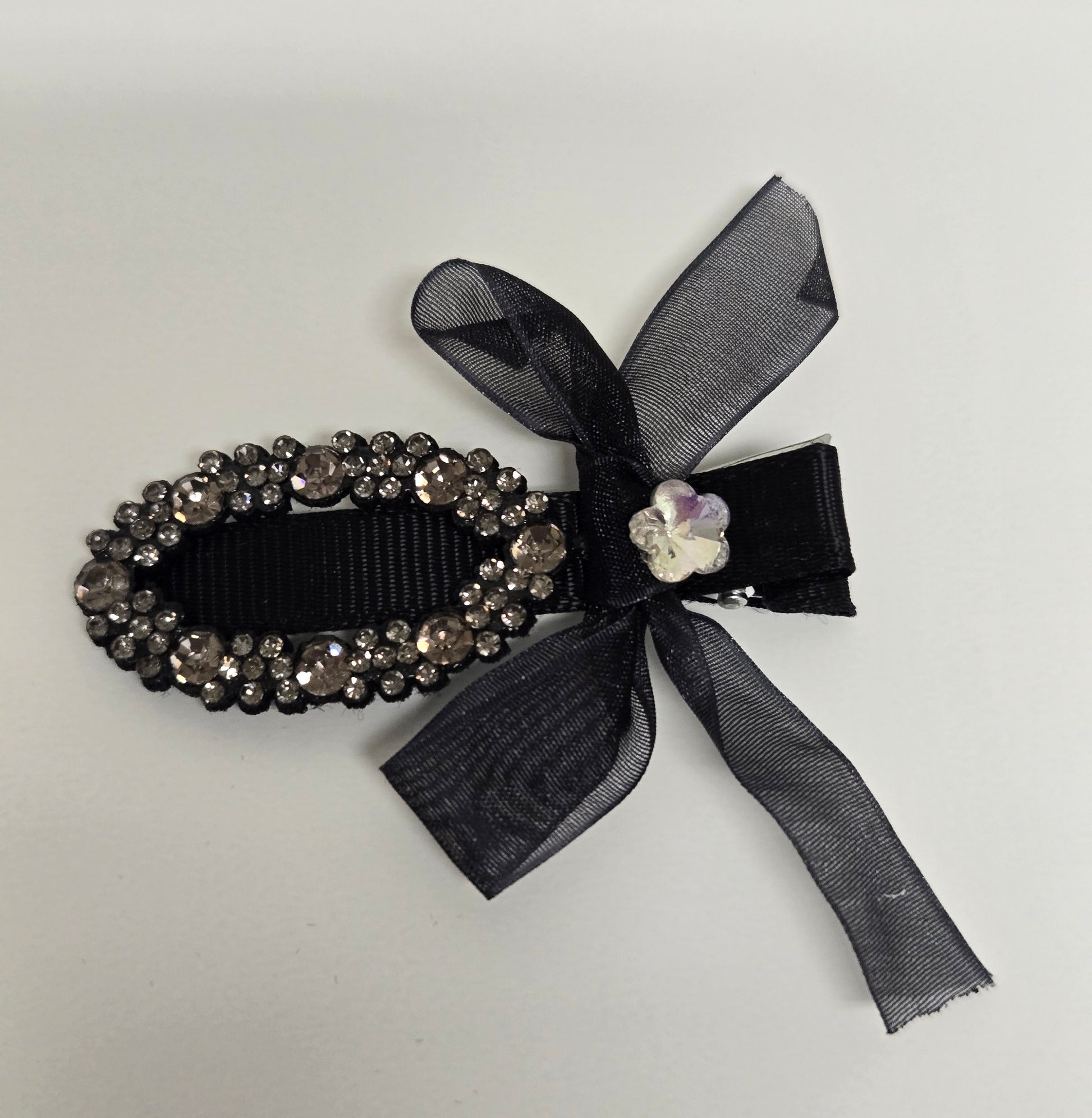 Black Oval Crystal Bow Hair Clip