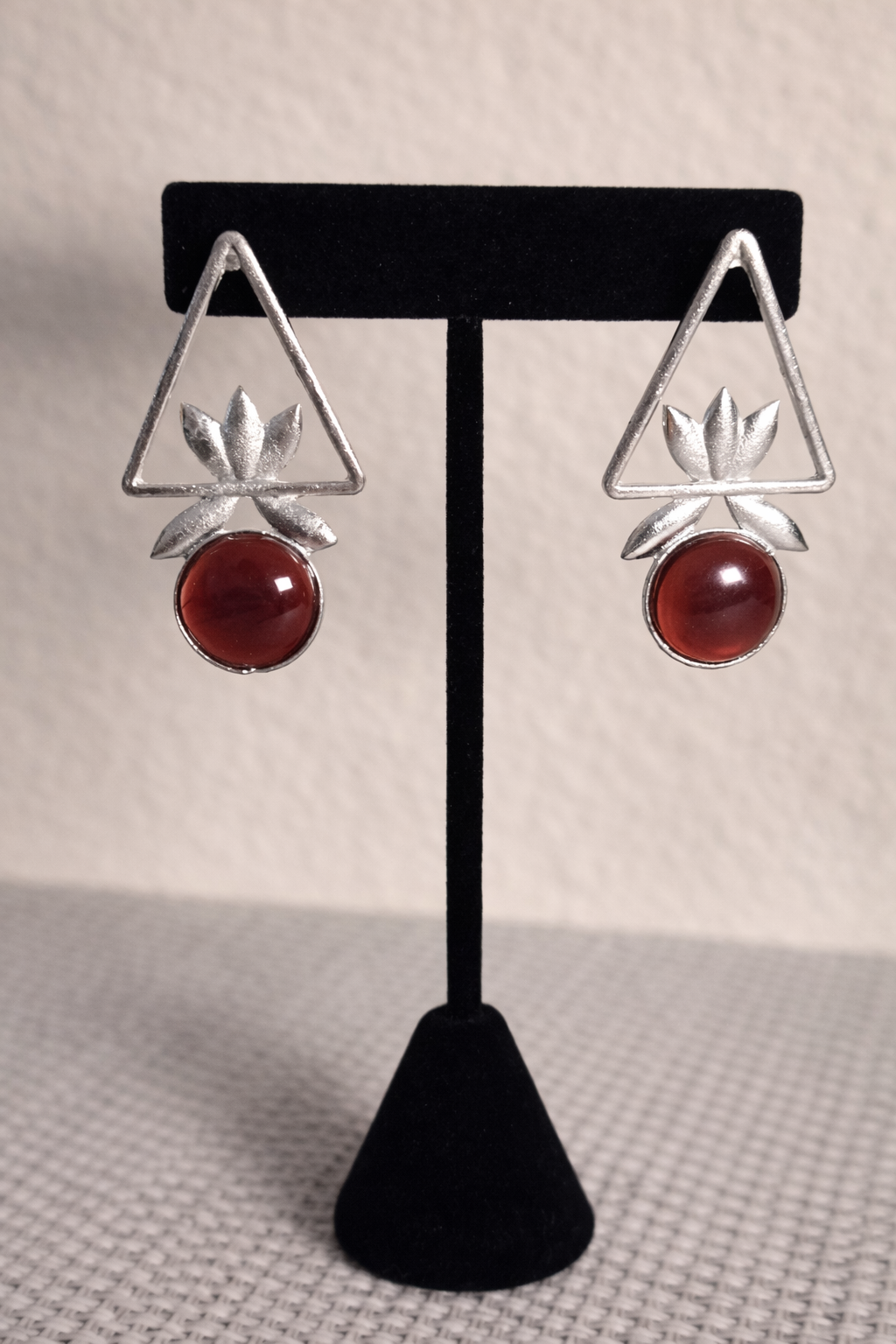 Geometric Floral Earrings with Maroon Stone